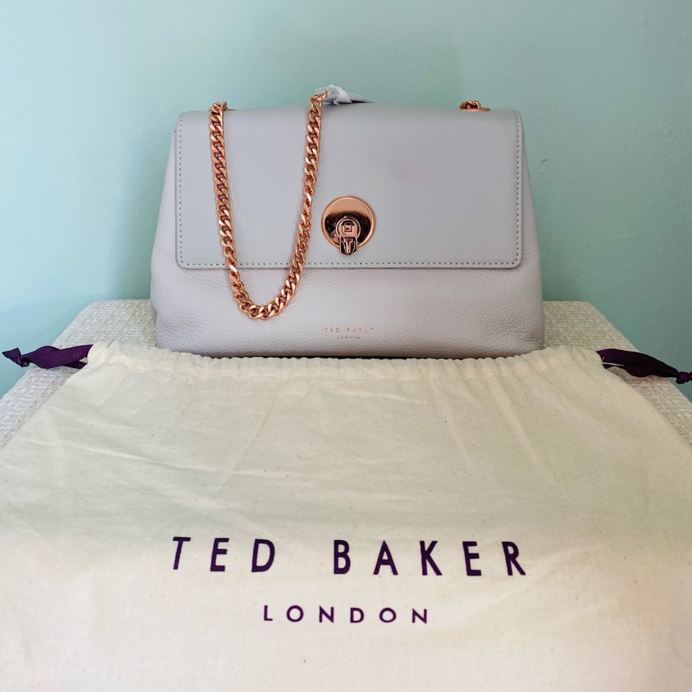 Ted Baker Bag color grey with rose gold chain.